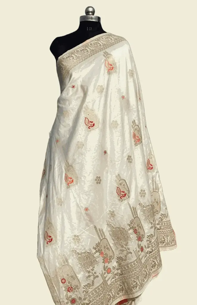 Maharani White Banarasi Saree with subtle Golden Hues